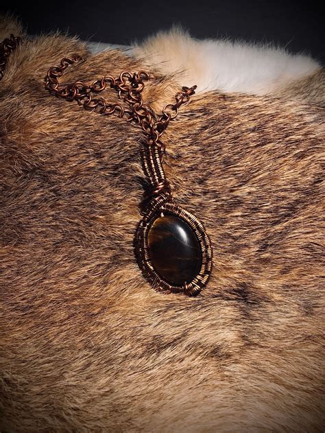 Practical magic tiger eye amulet necklace